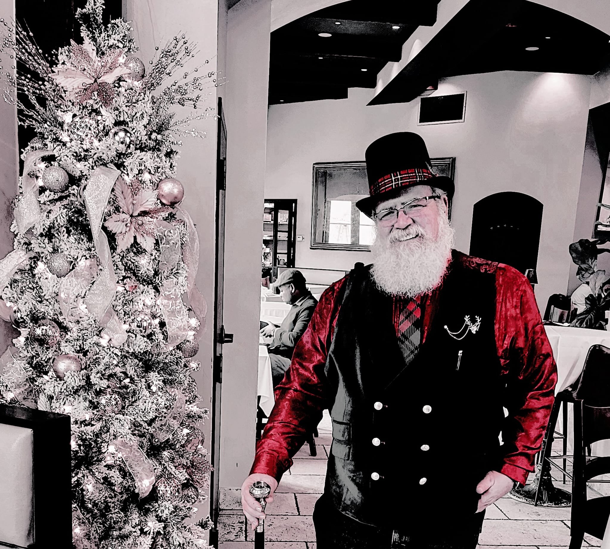 Stage Christmas Party — Jeffry in top hat and red velvet by the white Christmas tree at Stage, Sun · Dec 17, 2023