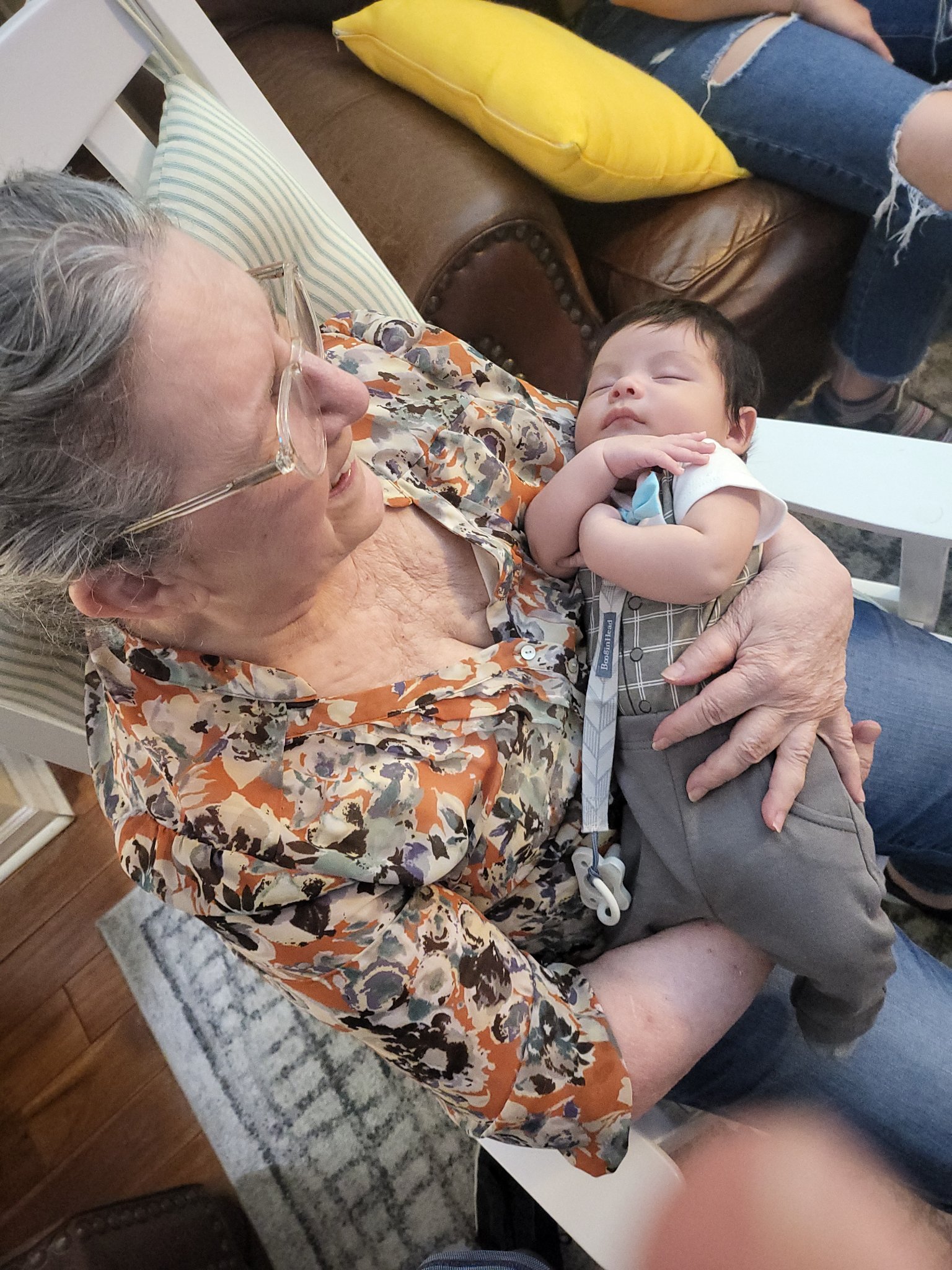 Met my grandchildren for the first time — Gail holding the sleeping baby close, Fri · Jul 12, 2024