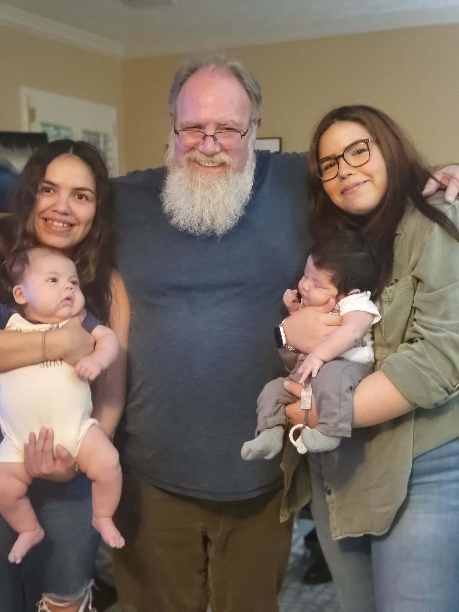 Met my grandchildren for the first time — Jeffry beaming, arms around his two daughters, each holding a baby, Fri · Jul 12, 2024