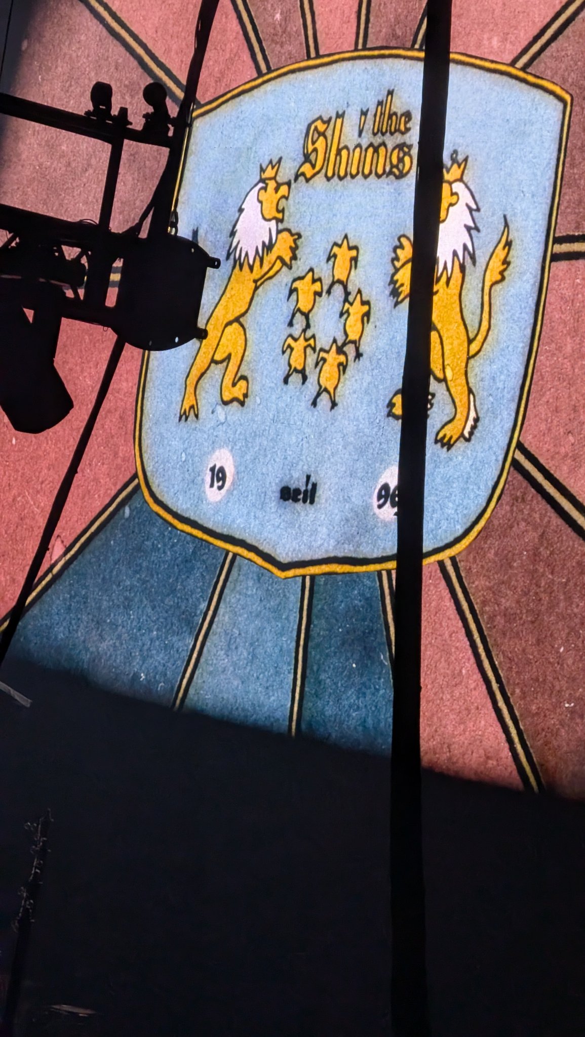 The Shins’ crest backdrop at State Farm Arena, photo taken at 7:50 PM
