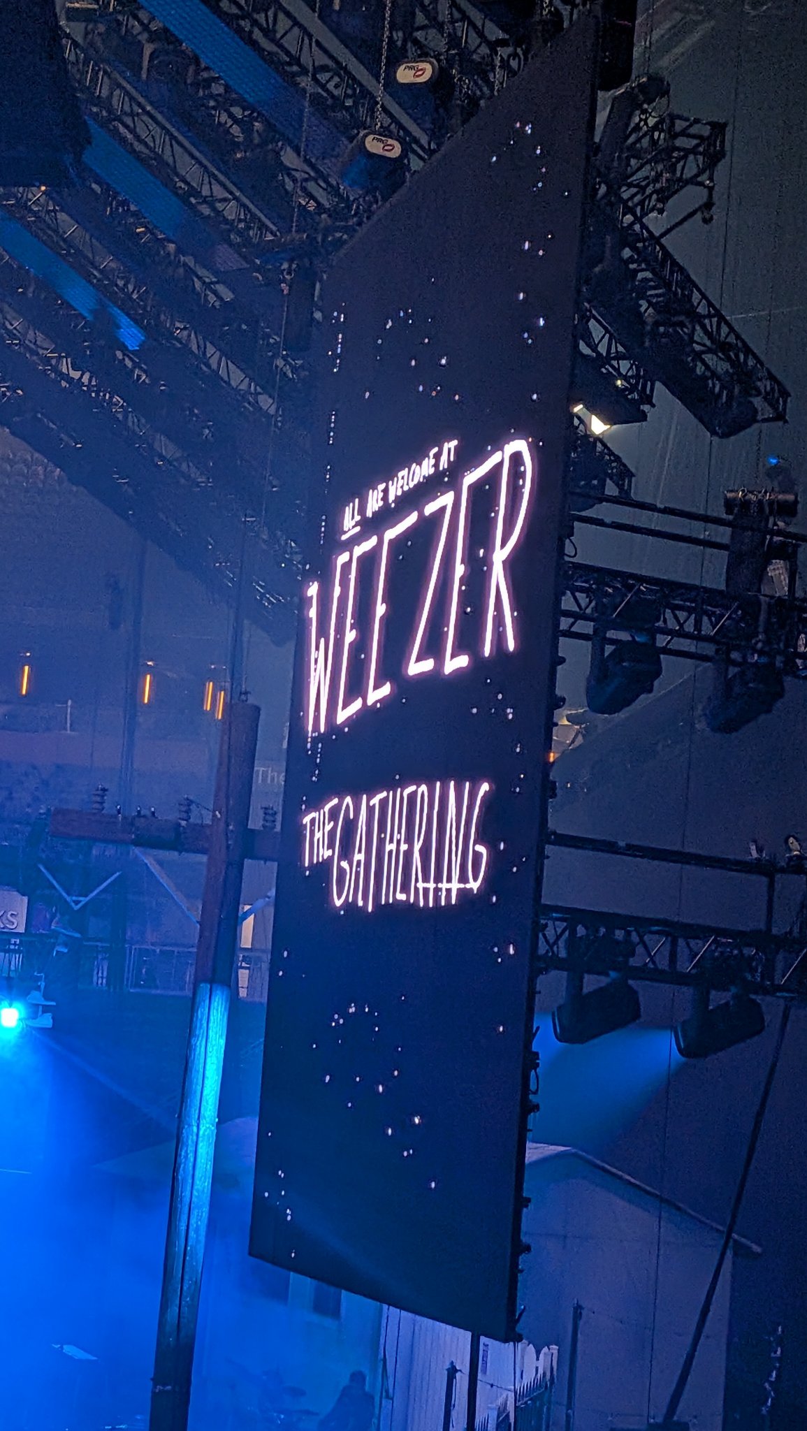Weezer at State Farm Arena — the arena screen reads “All are welcome at Weezer — The Gathering”, photo taken at 8:59 PM